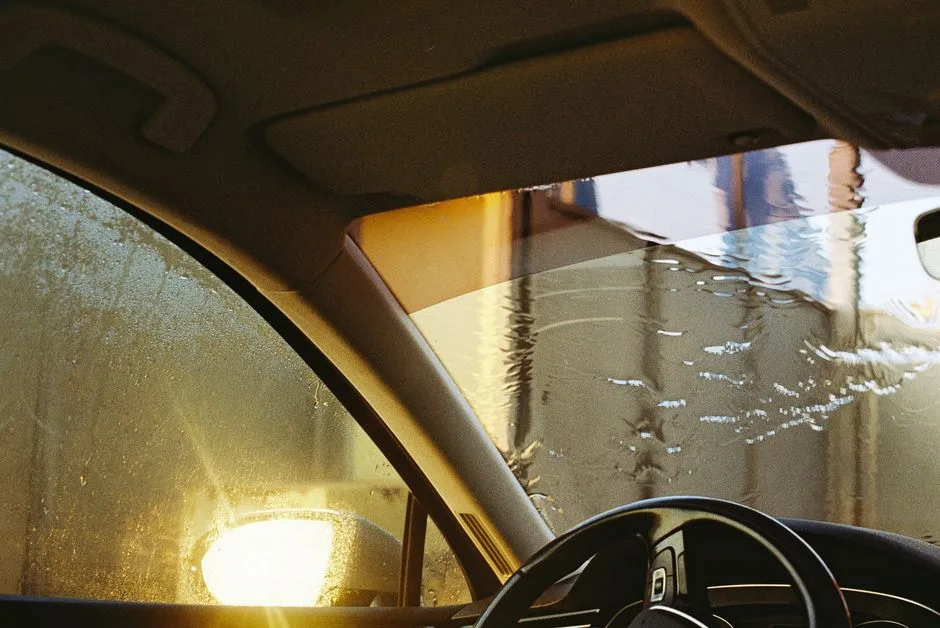 A person driving at sunrise, listening to Scripture during the quiet, unclaimed minutes of a morning commute