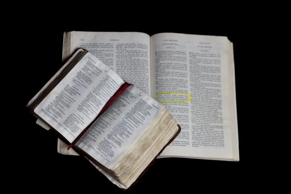 A Bible open next to a word search puzzle