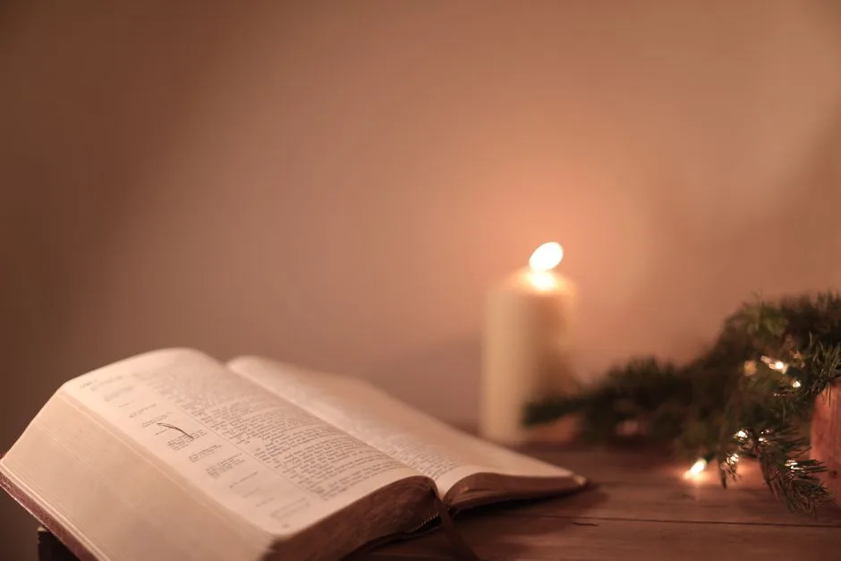 Candlelight beside an open Bible. Scripture lighting each step forward