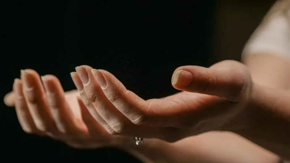 Open hands resting in sunlight — the simplicity of honest prayer without the right words