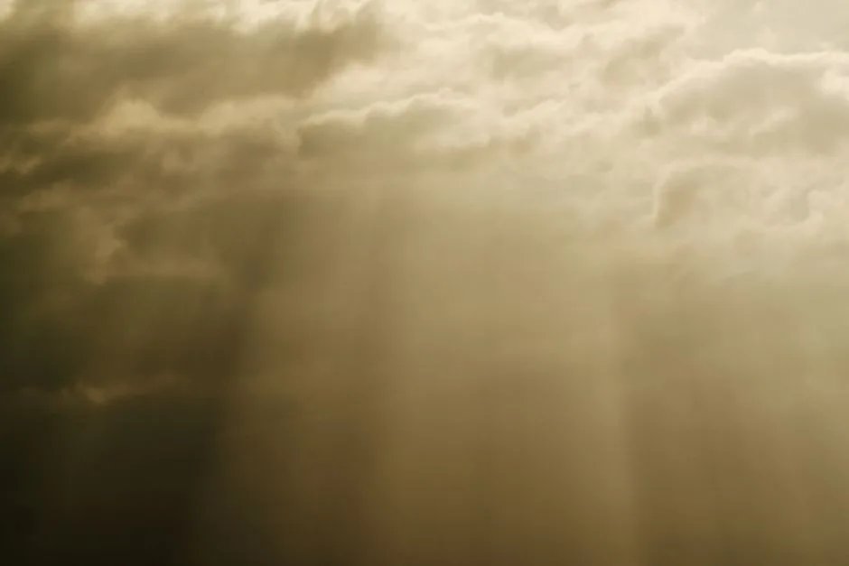 Light breaking through a stormy sky. Christ's victory over every trouble