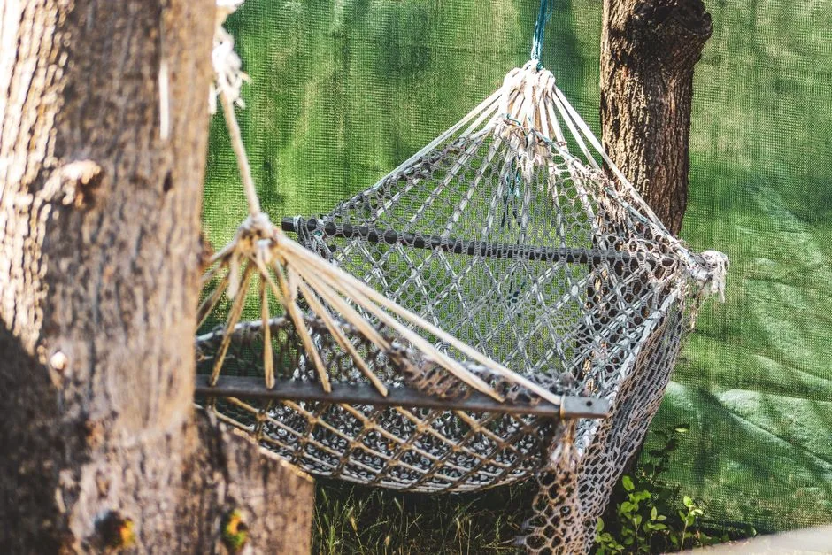 A peaceful hammock in dappled shade, the rest Jesus offers the weary