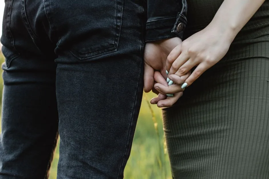 Two hands intertwined — mutual respect and agreement as the consistent biblical principle within marriage
