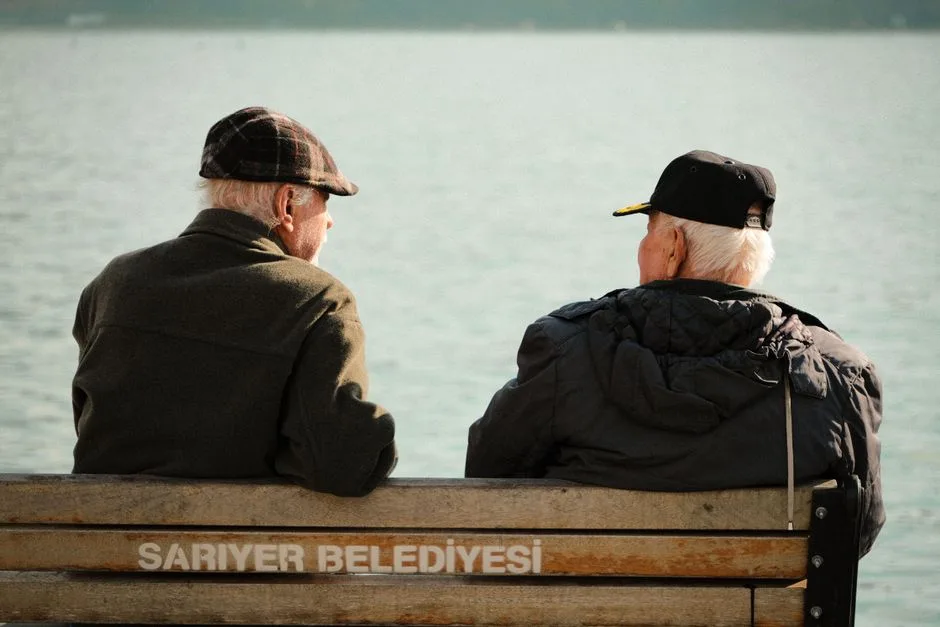 Two friends in quiet conversation — the real, practical comfort genuine encouragement provides