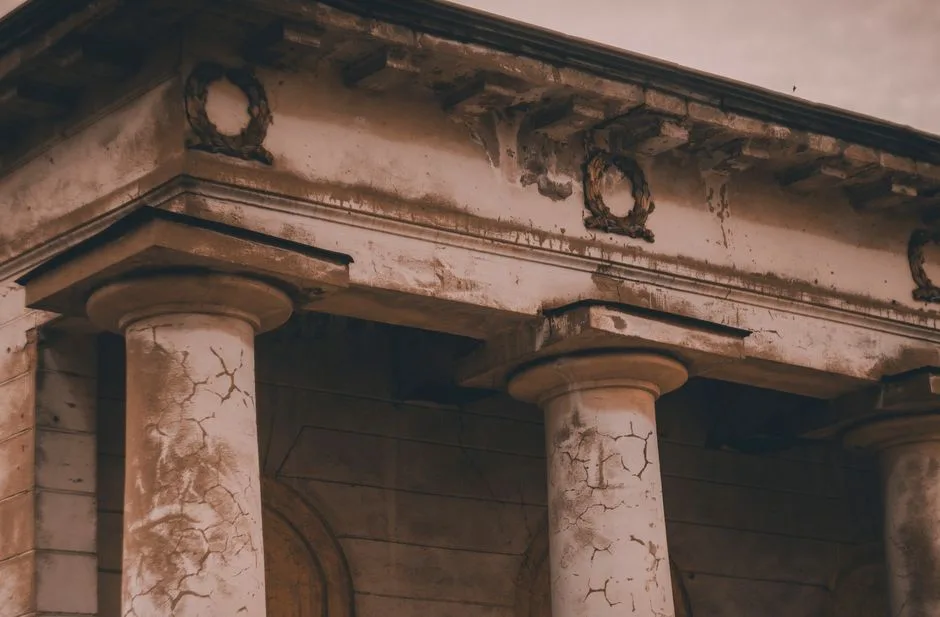 An ornate, beautiful building exterior against weathered stone — appearance versus what's underneath