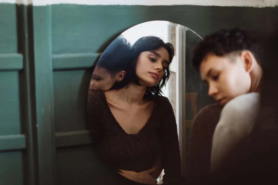 A mirror reflecting honest self-examination — looking inward before pointing outward