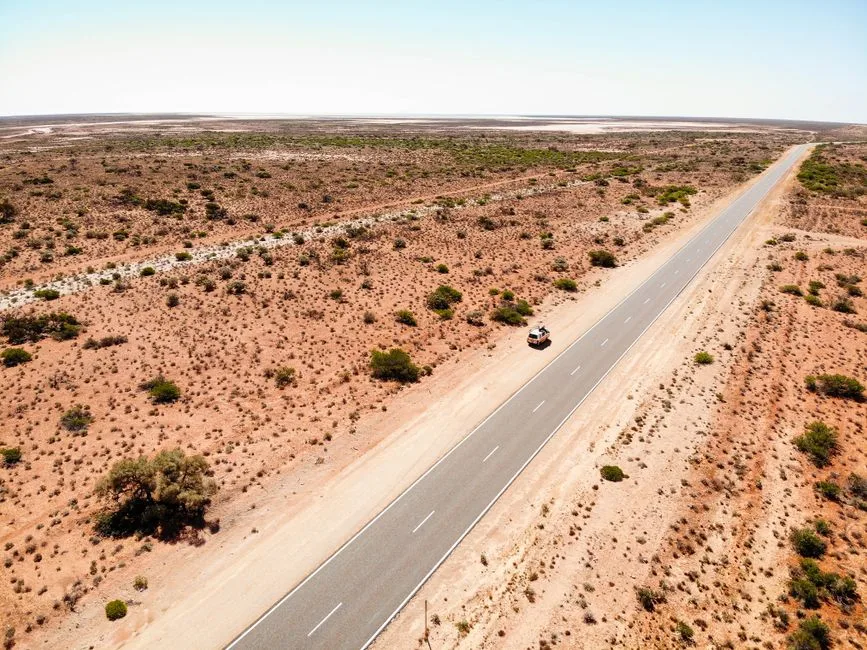 A single day's light on an open road — staying present instead of borrowing tomorrow's worry