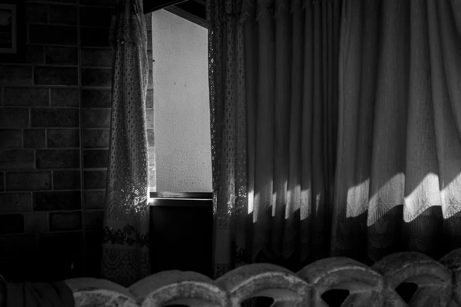 Soft light breaking into a dark room — God's nearness in the darkest moments