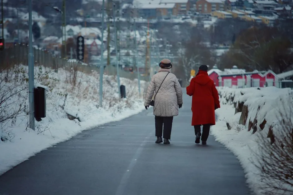 Two women walking together on a path — the loyalty and companionship that carried Ruth and Naomi through widowhood